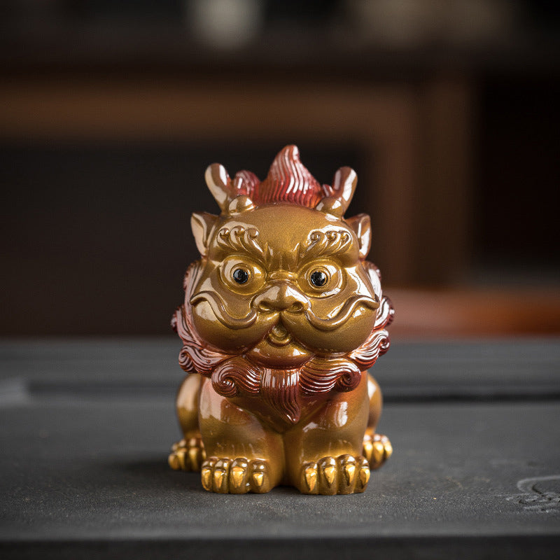 Small PiXiu Tea Pet – Single golden PiXiu front view on black stone tray, cute guardian statue