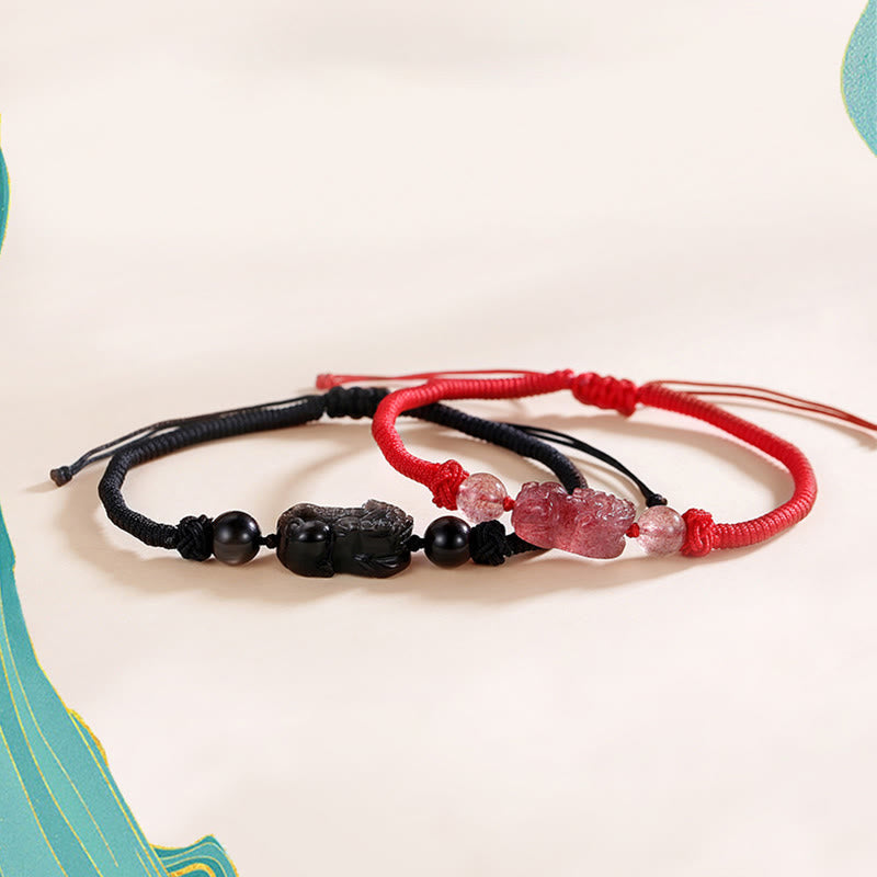 Silver Sheen Obsidian Bracelet – Black red couple bracelets on cream surface