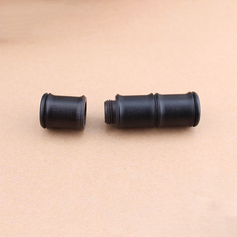 Ebony Wood Bamboo Prayer Box Necklace – Two black bamboo-segment pendant handles with grooved screw-thread connection detail, beige background