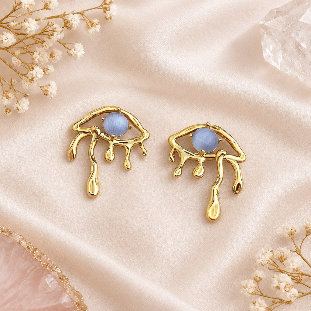 Gold Blue Cat's Eye Drip Earrings - Flat lay of the pair showing both gold frames and blue stones, product display
