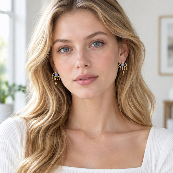 Gold Blue Cat's Eye Drip Earrings - Front model view of the drop silhouette and blue glass stone, women's jewelry