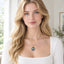 Gold Cable Navy Enamel Evil Eye Necklace – Worn at the collarbone, navy enamel pendant facing forward