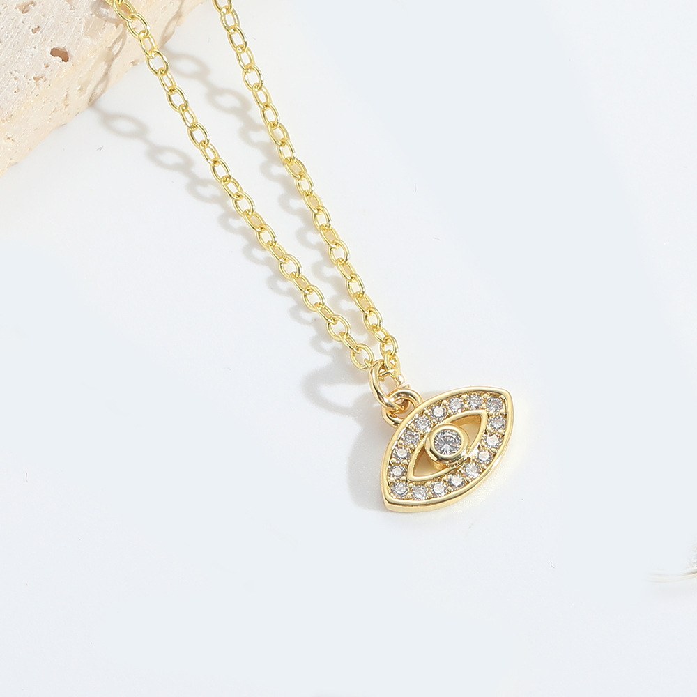 Gold Pave Evil Eye Necklace – Clear centre CZ, two-row white pave lids, gold almond eye