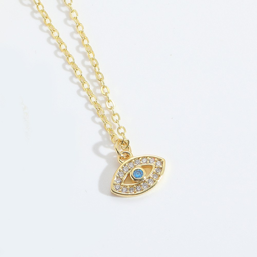 Gold Pave Evil Eye Necklace – Light-blue centre CZ, two-row white pave lids, gold almond eye
