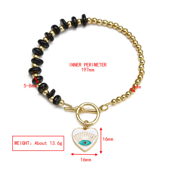 Gold Plated Copper Black and Purple Evil Eye Toggle Bracelet - Black Heart Eye - detail guide