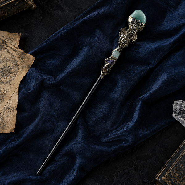 Handmade Green Aventurine Crystal Magic Ritual Wand with Wooden Shaft - flat lay