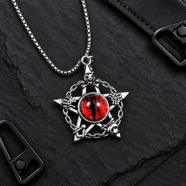 Men's Pentagram Dragon Eye Necklace – Pendant and chain on black stone with leather props, flat lay