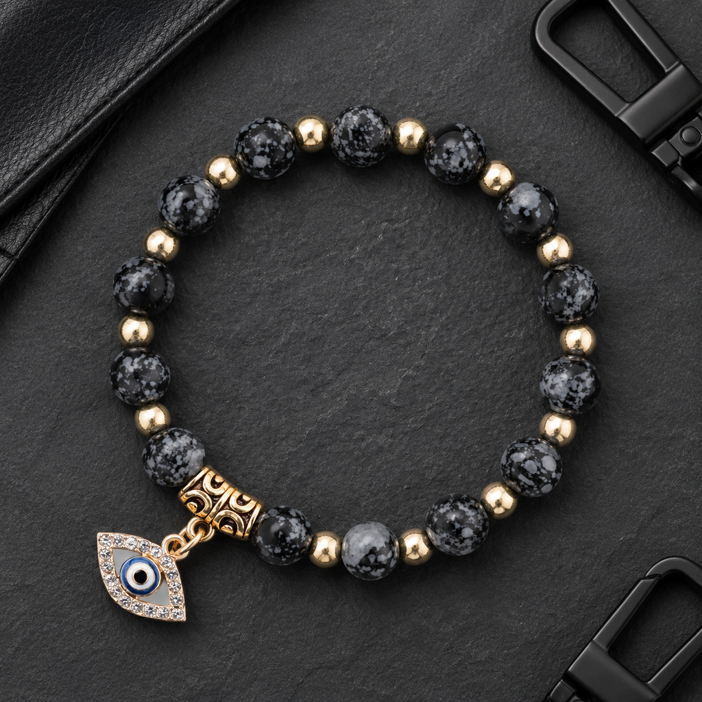 Black Snowflake Obsidian Evil Eye Bracelet - flat lay
