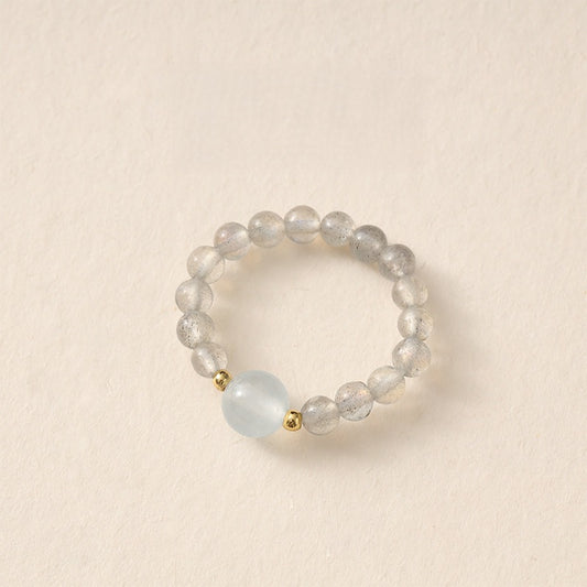Moonstone Pi Xiu Ring – Labradorite bead ring with pale blue moonstone center and gold spacers, emotional balance jewelry