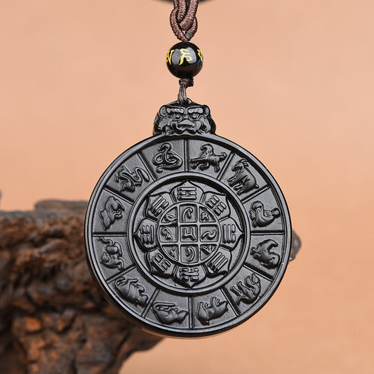 Obsidian Pendant – round Bagua zodiac disc, twelve animals around grid, dragon head top, glossy black obsidian, protection amulet