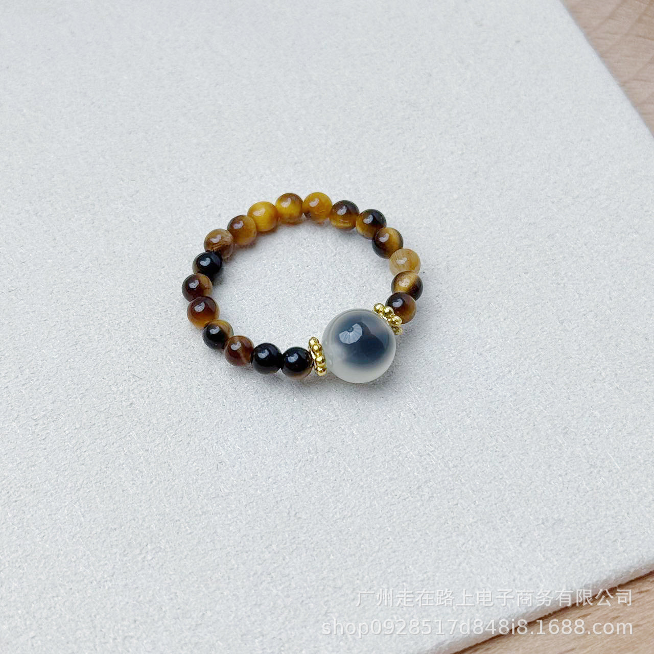 Tiger Eye Beaded Ring – Tiger eye beads with gray agate center stone on white, protection crystal ring