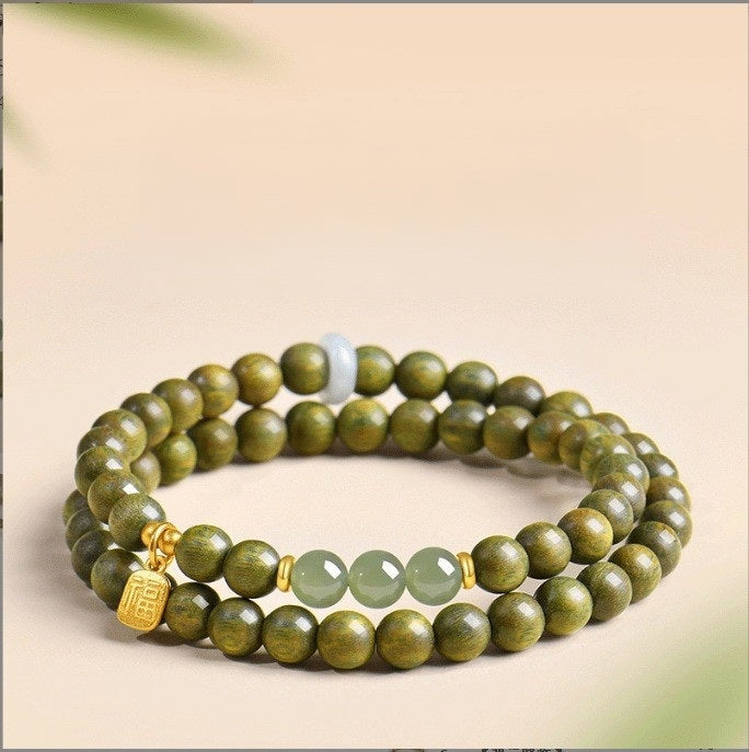 Green Sandalwood Bracelet – Double wrap with green jade and gold fortune charm on beige, Hetian jade