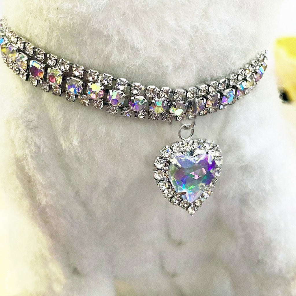 AB Crystal Pet Collar – Iridescent rhinestone band with heart pendant on white pet, aurora borealis dog jewelry