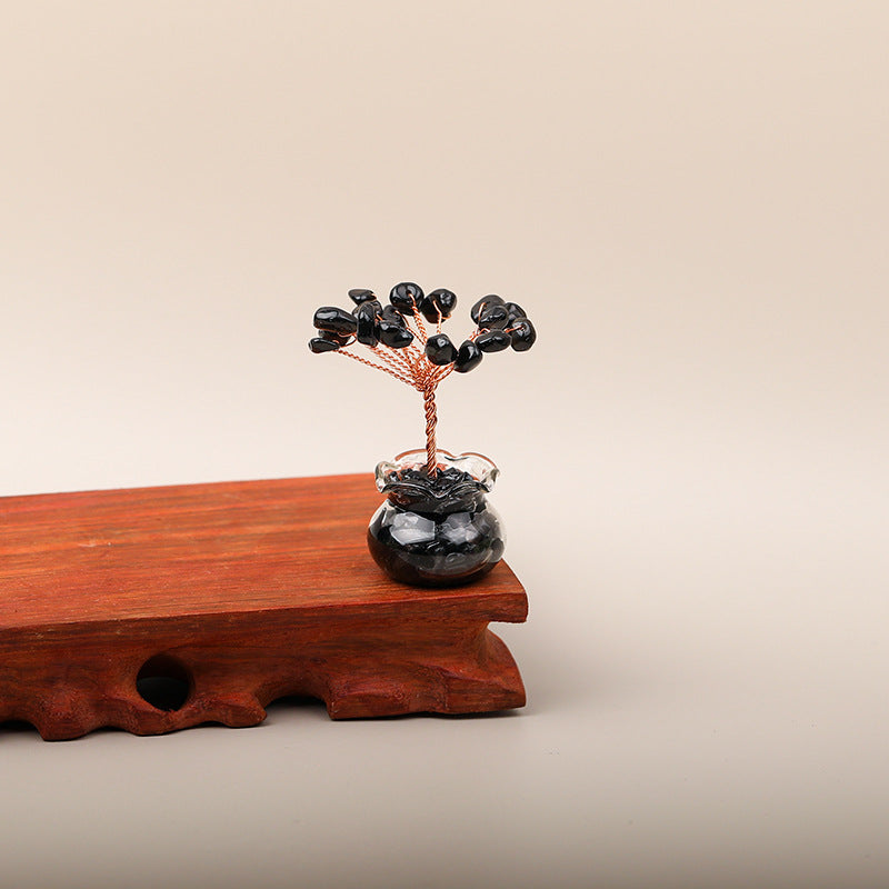 Mini Wealth Tree – black obsidian crystal tree on wooden stand, glass geode pot, beige background, protection ornament