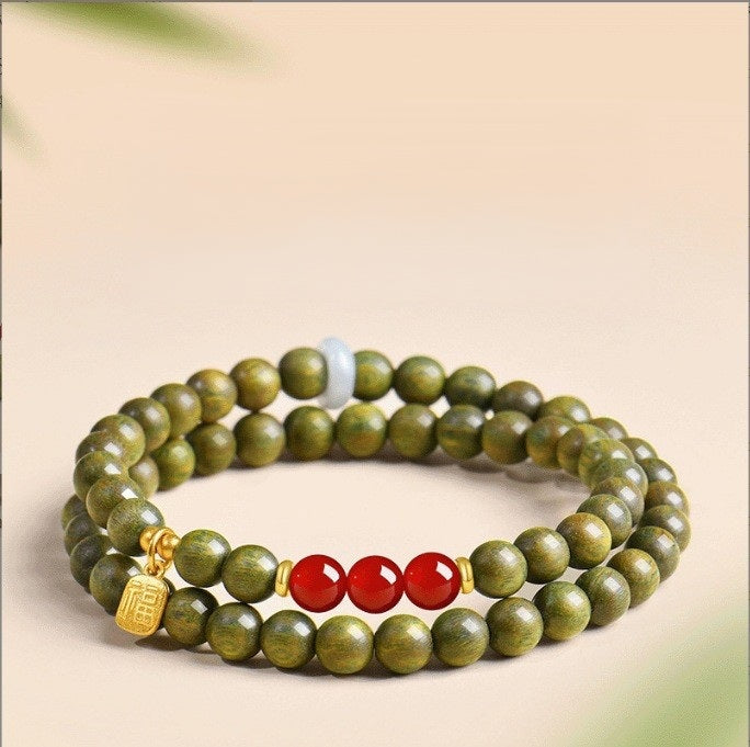 Green Sandalwood Bracelet – Double wrap with red agate and gold fortune charm on beige, scented wood