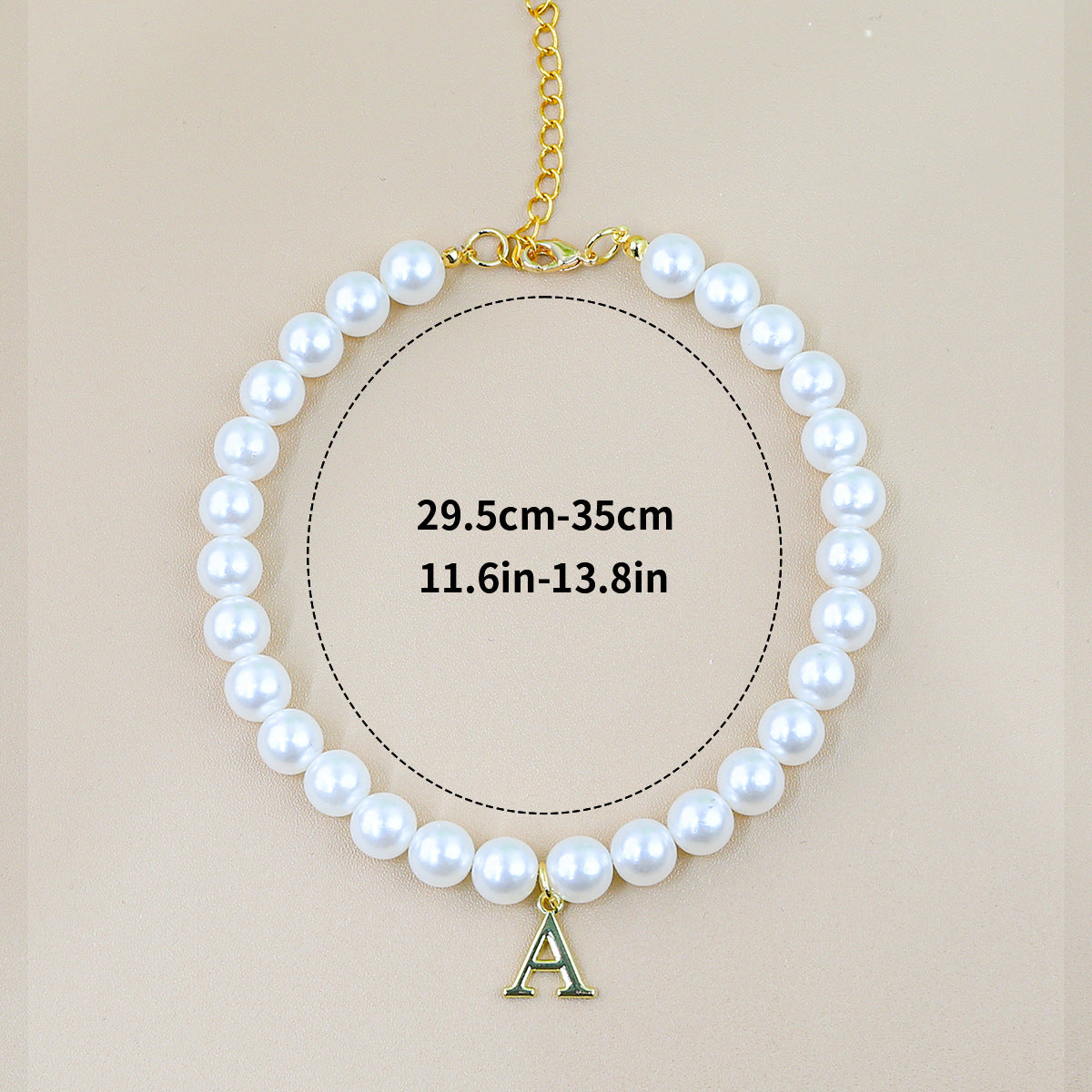 Luxury Crystal Pet Necklace – single pearl strand with gold letter A pendant, adjustable 29.5-35cm, beige backdrop