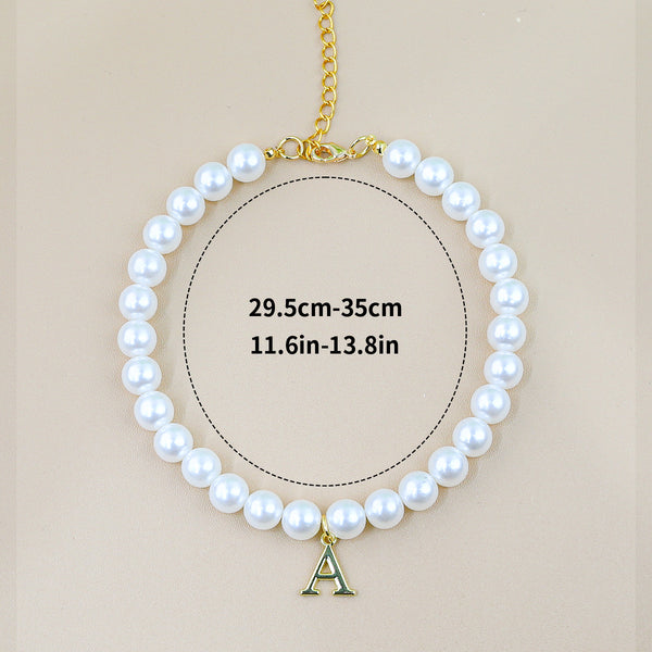 Luxury Crystal Pet Necklace – single pearl strand with gold letter A pendant, adjustable 29.5-35cm, beige backdrop