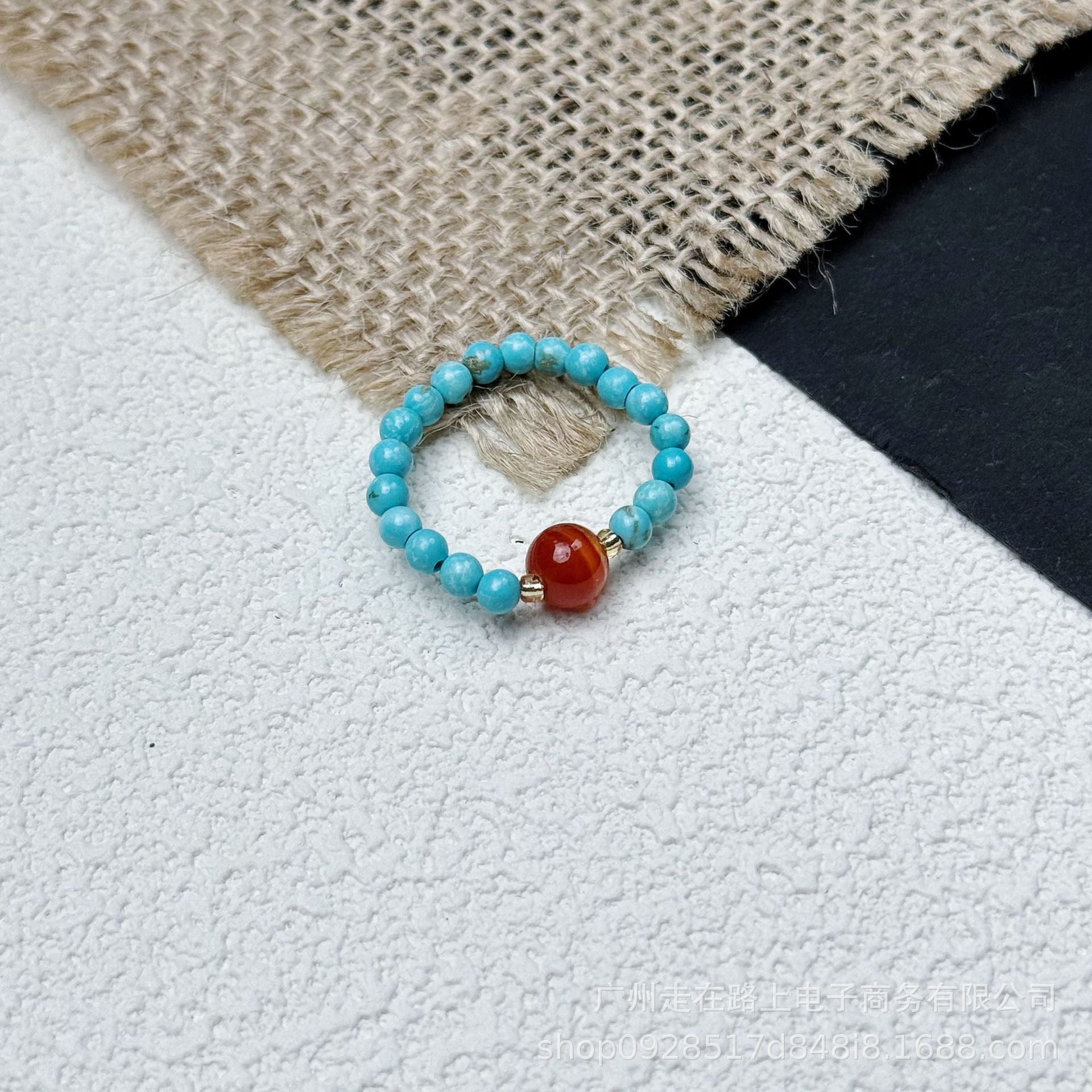 Tiger Eye Beaded Ring – Turquoise beads with carnelian center on white burlap, southwestern jewelry