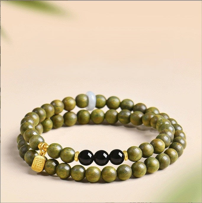 Green Sandalwood Bracelet – Double wrap with black obsidian and gold fortune charm on beige, jade wood