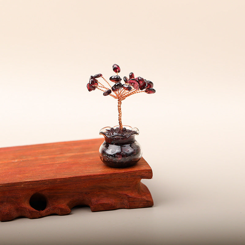 Mini Wealth Tree – garnet red crystal tree on wooden stand, glass geode pot, beige background, passion energy decor