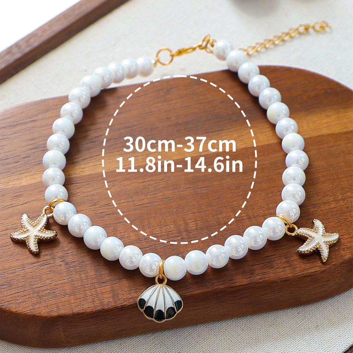 Luxury Crystal Pet Necklace – pearl strand with starfish and seashell charms, white enamel, wood tray, 30-37cm