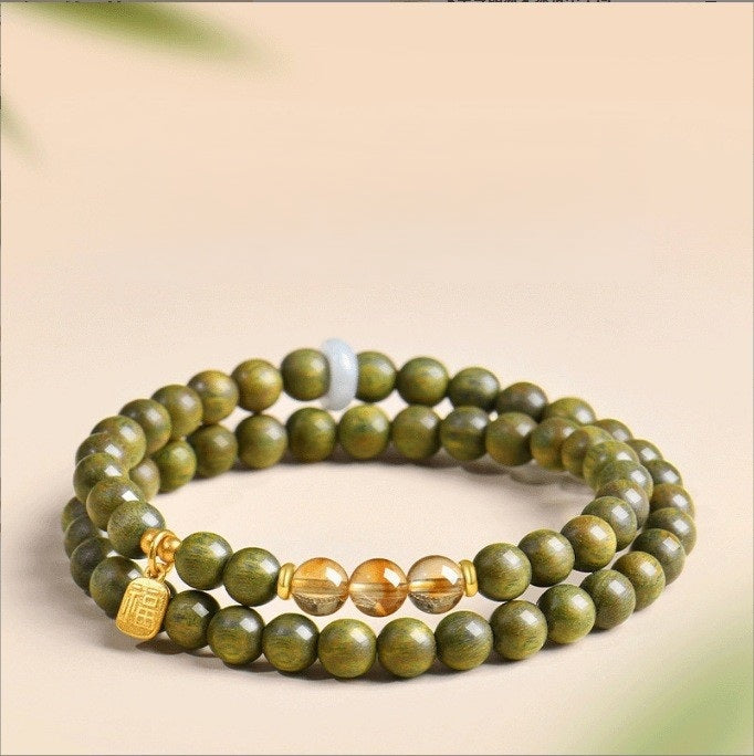 Green Sandalwood Bracelet – Double wrap with citrine and gold fortune charm on beige, aromatic wood