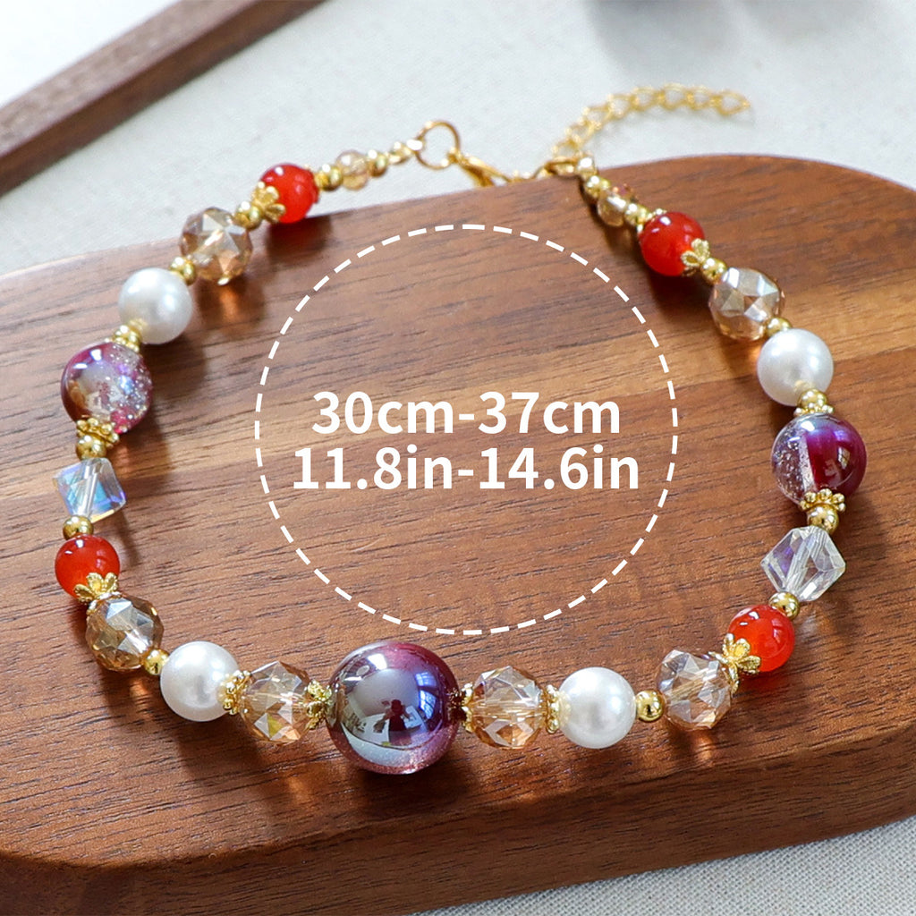 Luxury Crystal Pet Necklace – burgundy iridescent focal bead with pearl and crystal beaded collar, wood display