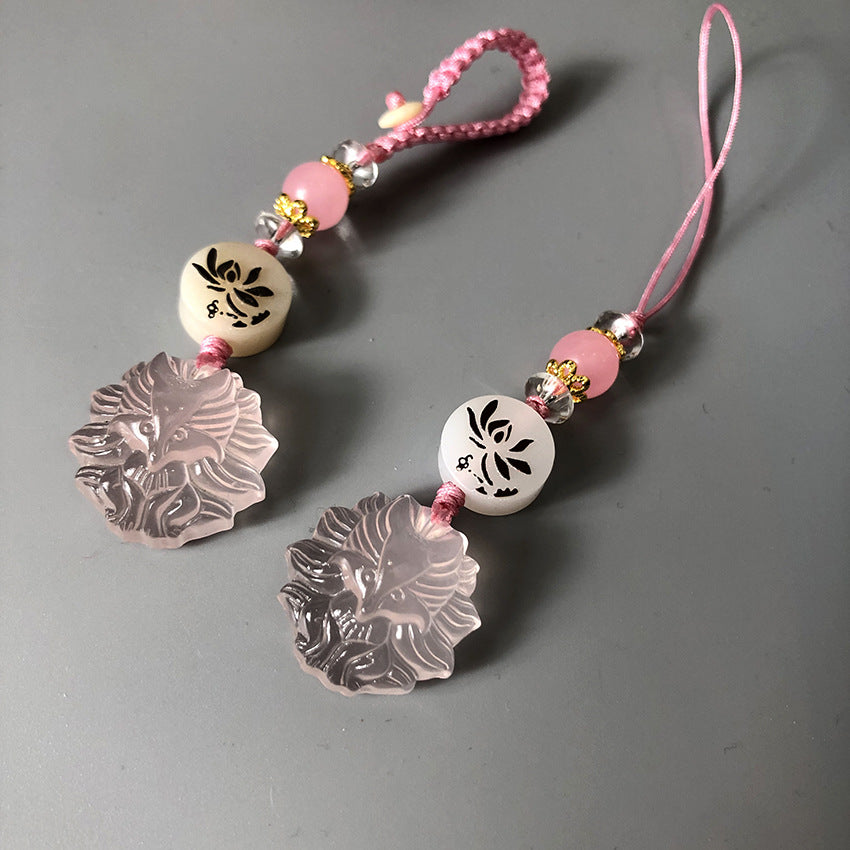 Quartz Fox Keychain – pair of pink crystal nine-tailed fox pendants with lotus beads on grey background, love crystal jewelry Main image