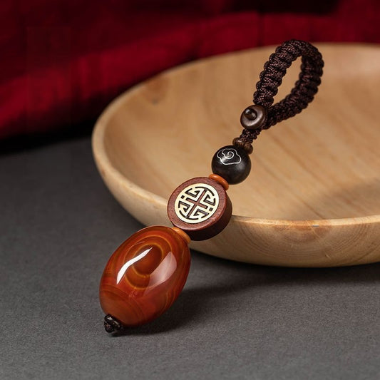 Red Agate Car Keychain – large red agate barrel bead with wan-symbol wood and cloud agate on tray, feng shui car charm