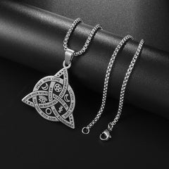 Celtic Moon Star Necklace – silver triquetra pendant with chain on black fabric, Viking protection jewelry