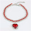 Rhinestone Pet Collar – Ruby red crystal band with red heart pendant, silver prong setting, luxury dog jewelry