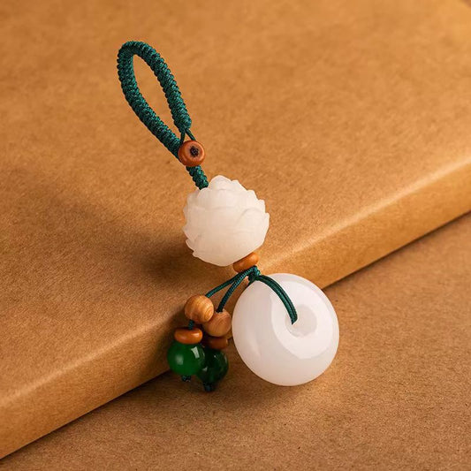 Chalcedony Lotus Keychain – white chalcedony lotus and peace buckle with green beads on kraft box, zen keychain