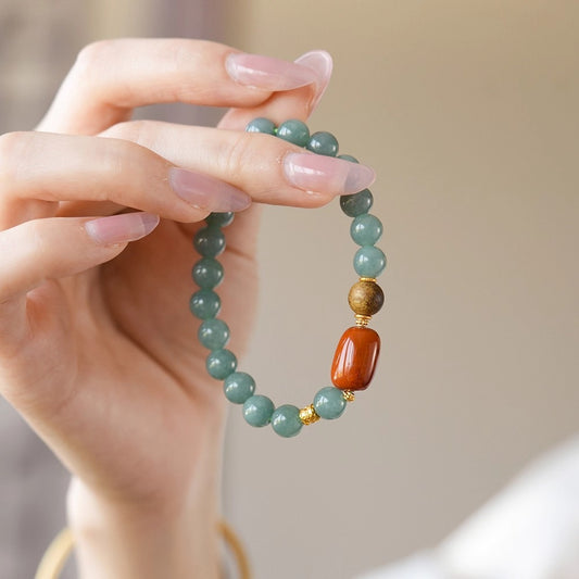 Blue Feicui Jade Two-Row Bracelet – hand-held close-up showing jade, red agate, and agarwood beads