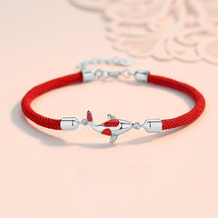 Koi Bracelet – red braided cord with silver koi fish charm and red enamel accents