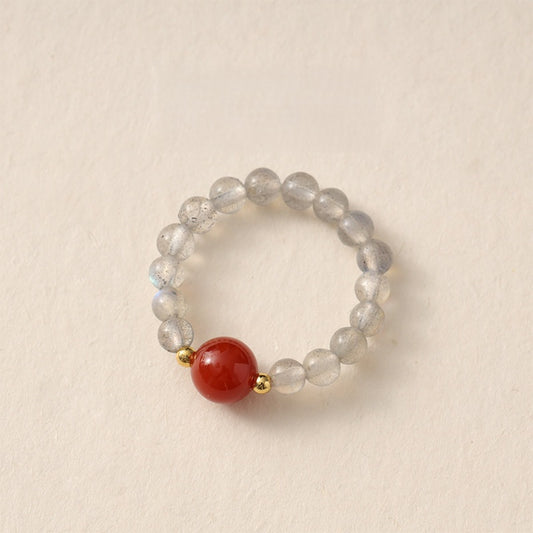 Moonstone Pi Xiu Ring – Grey moonstone beaded ring with red carnelian center bead and gold accents, serenity ring