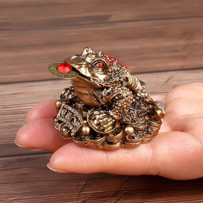 Bronze Money Toad – antique copper frog in hand for size reference textured skin detail, wealth feng shui