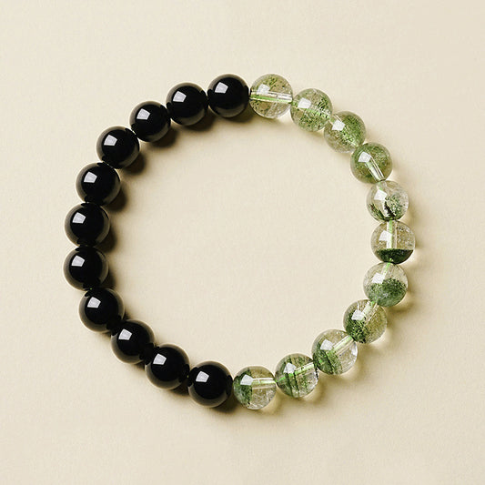 Obsidian Green Phantom Bracelet – flat lay on cream background showing obsidian and phantom quartz