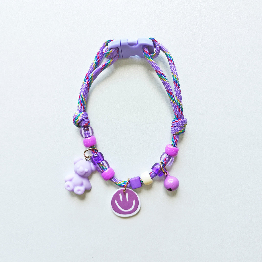 Adjustable Cat Collar – Purple rainbow rope with teddy bear, smiley face & pink bell, Y2K pet collar