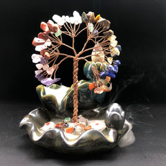 Crystal Tree Incense Burner – front view copper tree with amethyst on glazed lotus base, cascading smoke, black background, altar decor