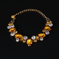 Pet Rhinestone Collar – Gold-tone amber and champagne crystal bib necklace on black, luxury pet accessory