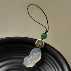 Chalcedony Pixiu Keychain – carved pixiu pendant with green jade bead on black ripple plate