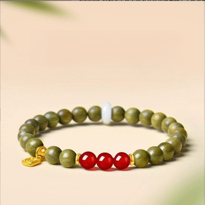 Green Sandalwood Bracelet – Single wrap with red agate center beads, gold spacer on beige, scented wood