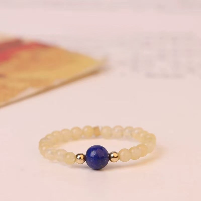 Jade Lapis Ring – Pale yellow jade bead ring with blue lapis lazuli center and gold spacers, wisdom jewelry