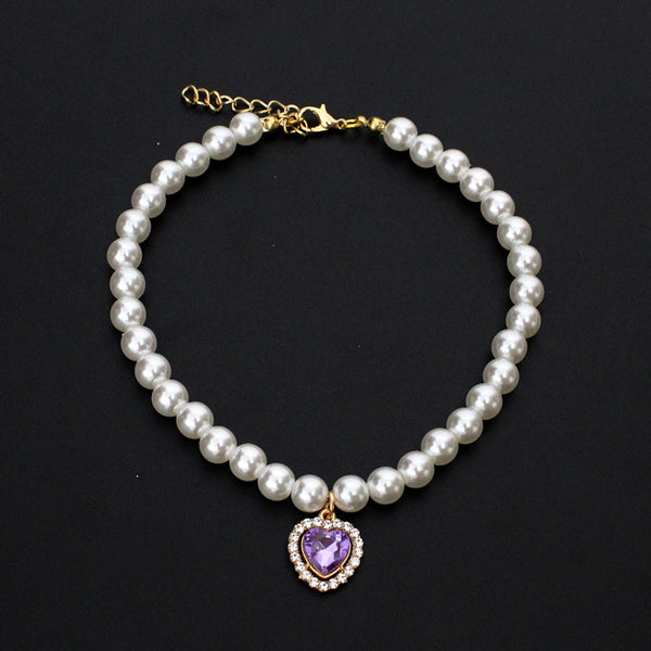 Crystal Heart Pet Necklace – Pearl collar with purple heart crystal pendant bordered with small rhinestones