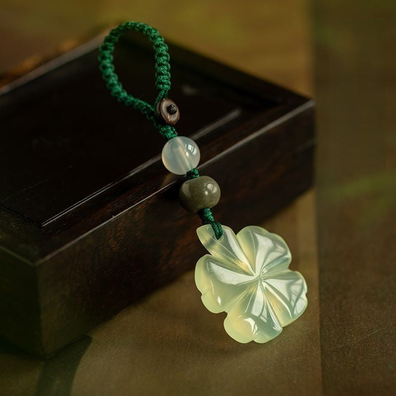 Jade Clover Keychain – carved clover with smooth beads, green braided cord on wooden box