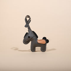 Feng Shui Leather Horse Keychain – Gray PU leather horse with black mane and tan saddle, charm gift