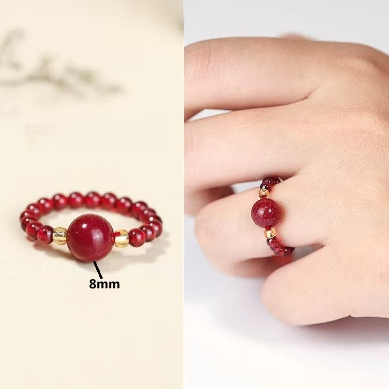 Cinnabar Bead Ring – 8mm red cinnabar bead ring with gold spacers, split product and worn view, adjustable ring