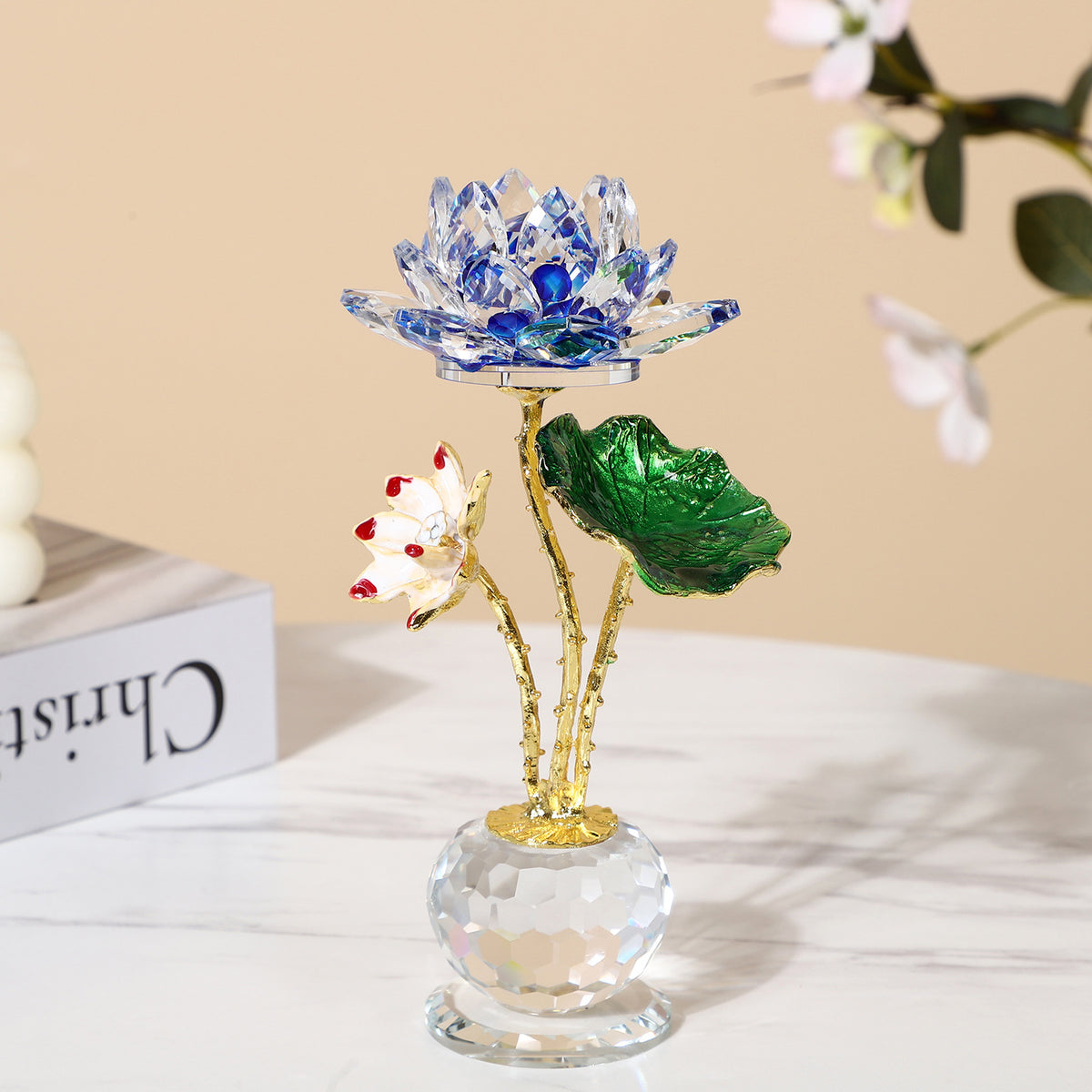 Crystal Lotus – blue crystal lotus with gold textured stem, green leaf, crystal base, wealth energy decor piece