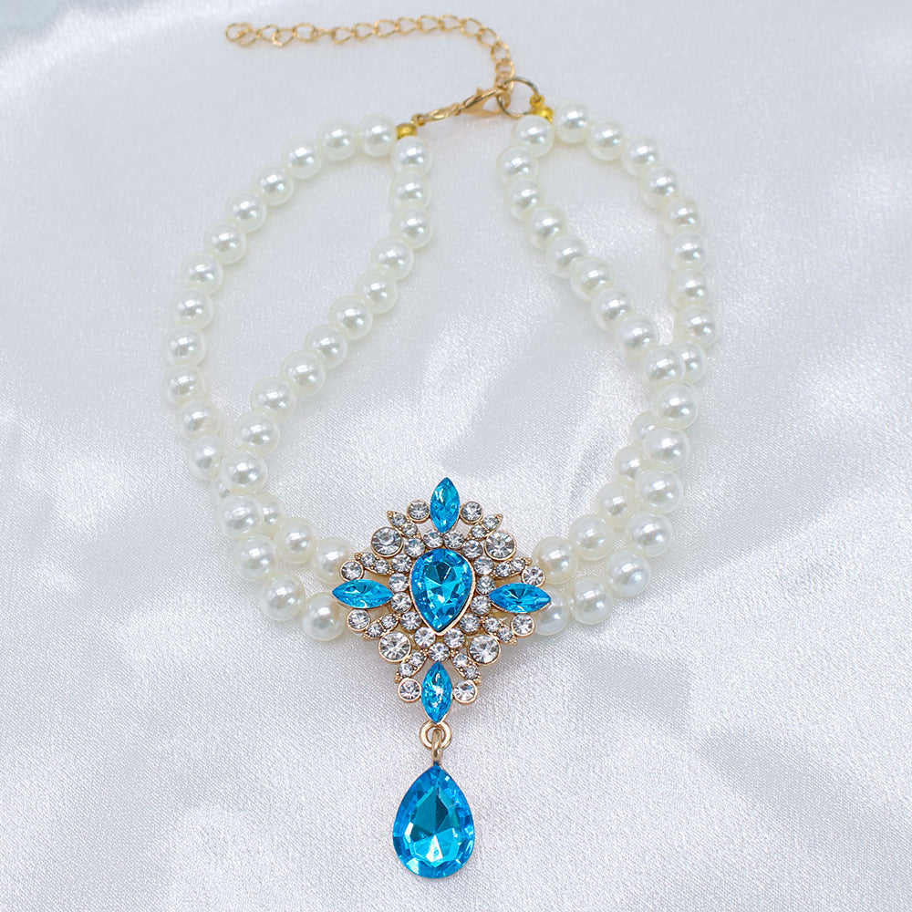 Elegant Pearl Crystal Collar – Double-layer pearl collar with aqua teardrop crystal pendant, white satin
