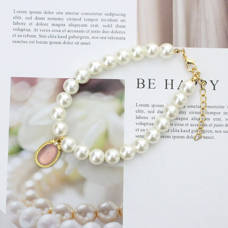 Pearl & Rose Quartz Pet Collar – Cream pearl strand with pink cabochon pendant, gold setting, feng shui pet necklace